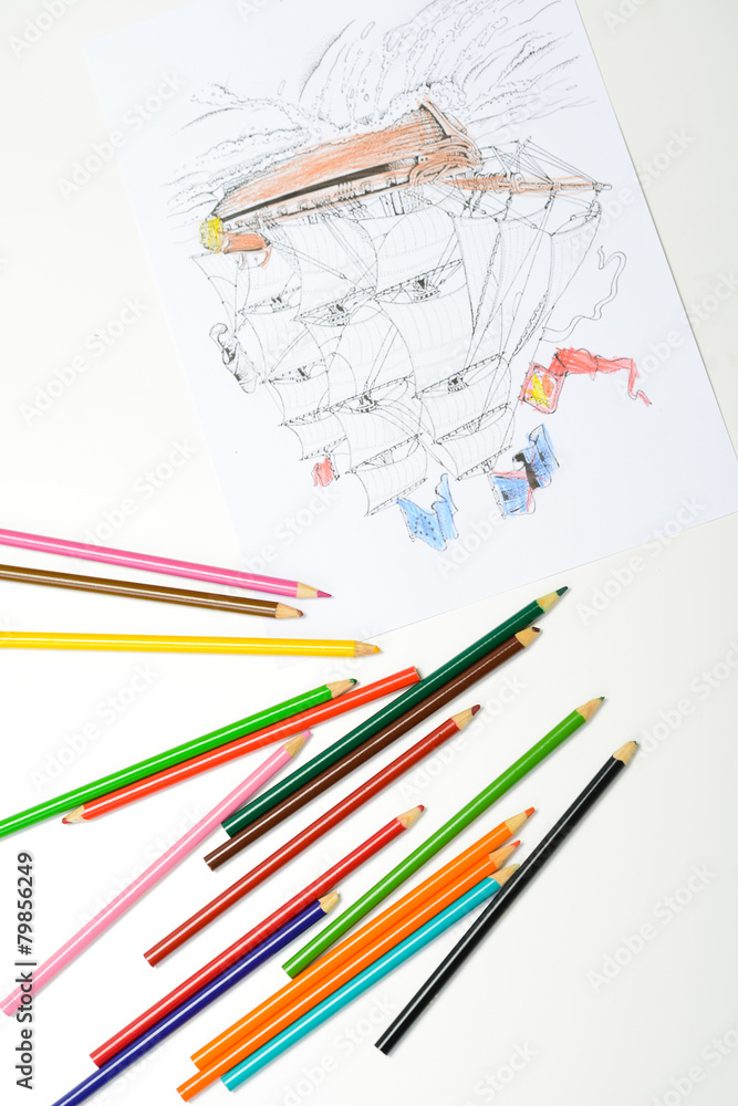 multicolored pencils with pirate boat drawing in white sheet multicolored pencils with pirate boat drawing in white sheet