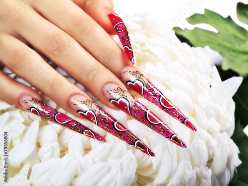 Red design on  nails.