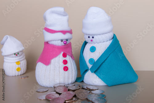 Toy snowmen family and small family budget