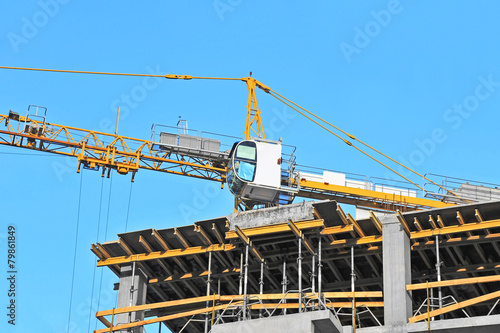 Wallpaper Mural Crane and building construction site against blue sky Torontodigital.ca