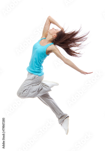Fotografie New pretty modern slim hip-hop style dancer teenage girl jumping