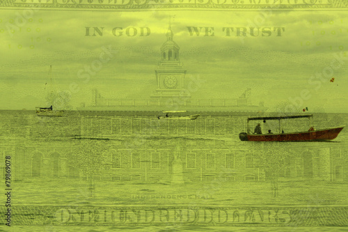 Double exposure boats on ocean water with hundred dollar photo