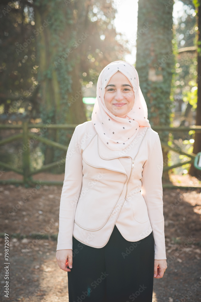 young beautiful muslim woman at the park young beautiful muslim woman at the park