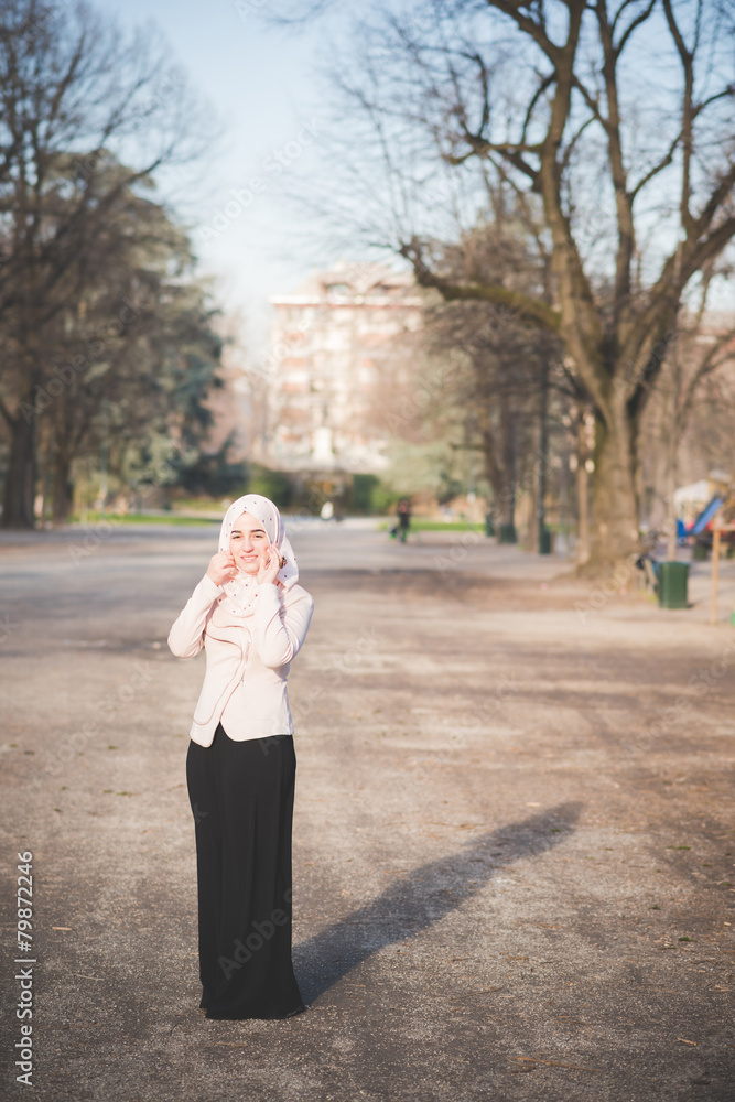 Fototapeta premium young beautiful muslim woman at the park