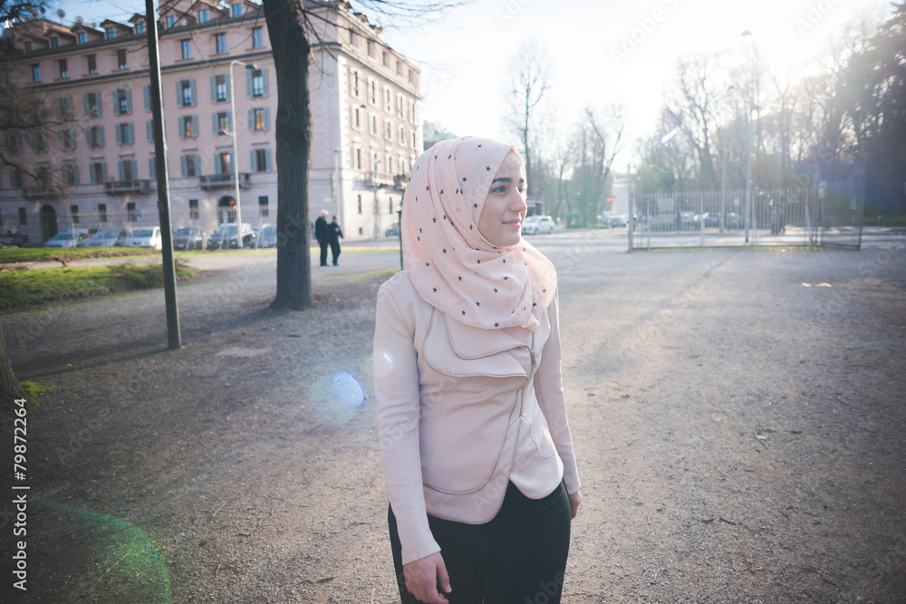 young beautiful muslim woman at the park