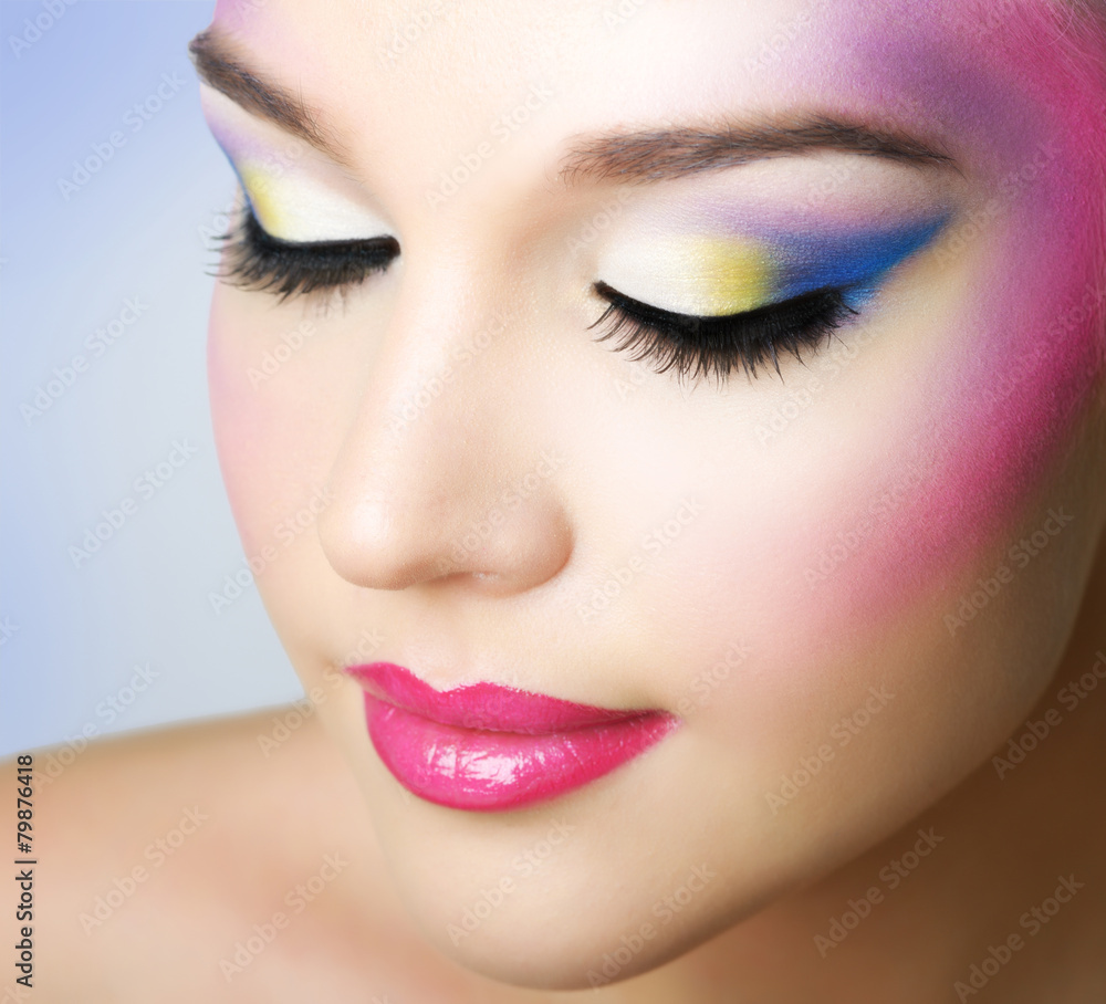 Beautiful girl with fashion bright makeup