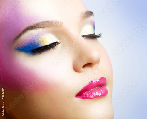Beautiful girl with fashion bright makeup