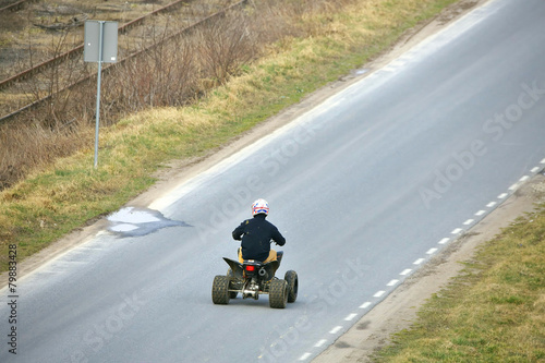 Young man on a quad