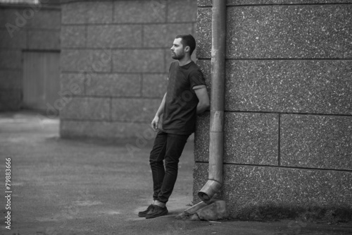 Confident man posing in selvedge jeans