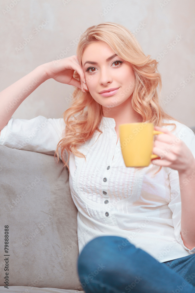 Beautiful young woman relaxing at home Beautiful young woman relaxing at home