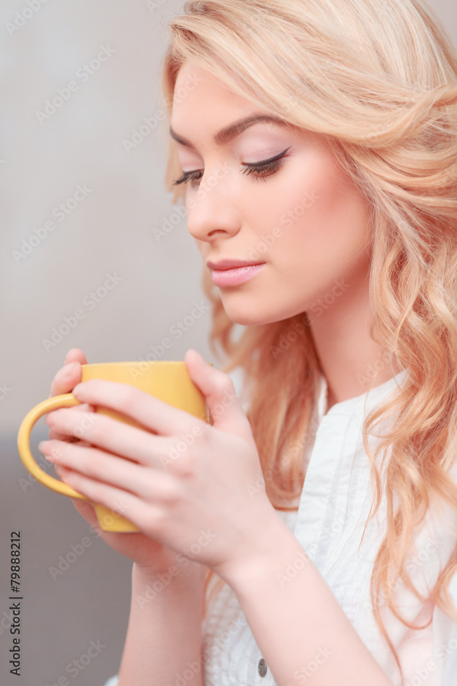 Beautiful young woman relaxing at home Beautiful young woman relaxing at home