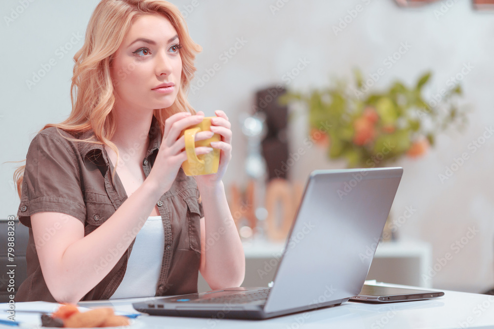 Beautiful young woman surfing in net Beautiful young woman surfing in net