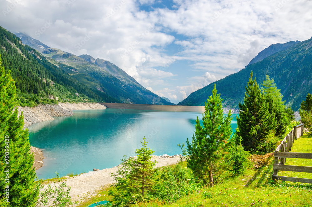 Azure lake in the background the peaks of the Alps, Austria