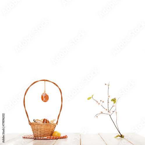 Basket with eggs on picnic table