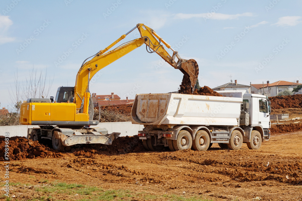 Excavator and tipper truck Excavator and tipper truck