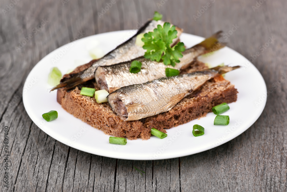 Sandwich with sprats and green onion Sandwich with sprats and green onion