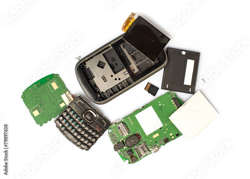 Disassembled mobile phone parts on white background
