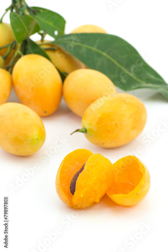 Marian plum slice isolated in white background
