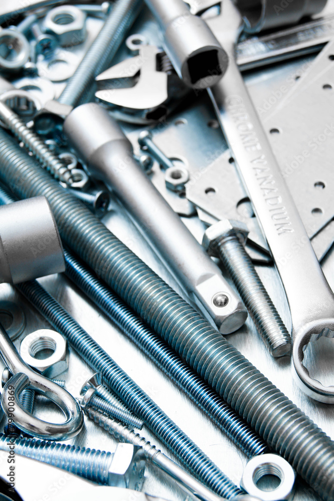 Many tools on the scratched metal background. Many tools on the scratched metal background.