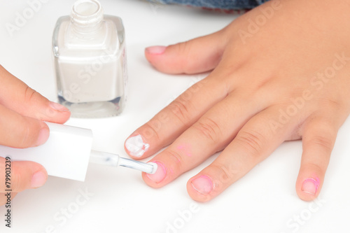 girl painting nails