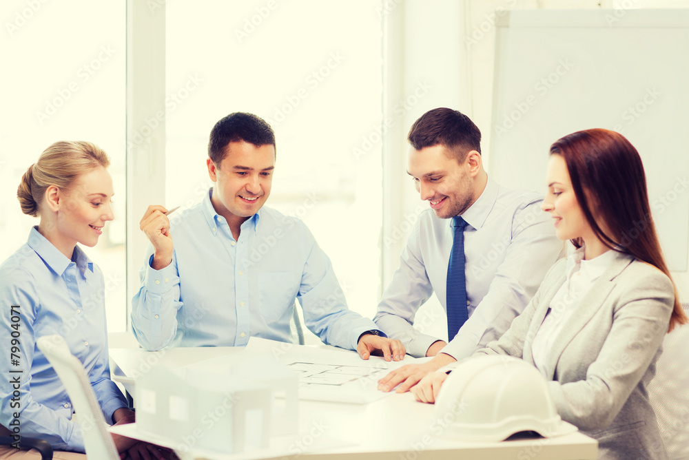 happy team of architects and designers in office happy team of architects and designers in office