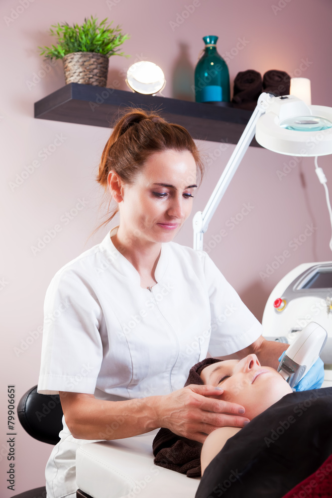 Fototapeta premium Beauty treatment in modern beauty salon. Beautician