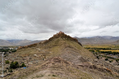 Clouds covered Gyantse fort in Tibet photo