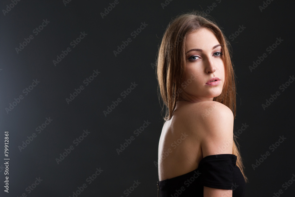 The beautiful woman with a naked back. The beautiful woman with a naked back.