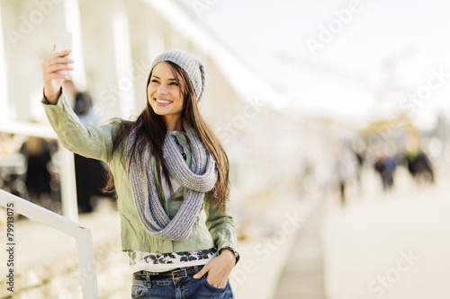 Young woman taking selfie