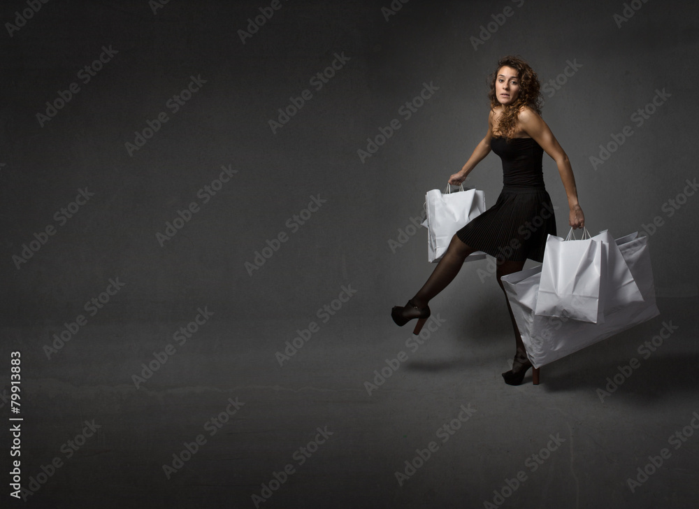 woman running with bags