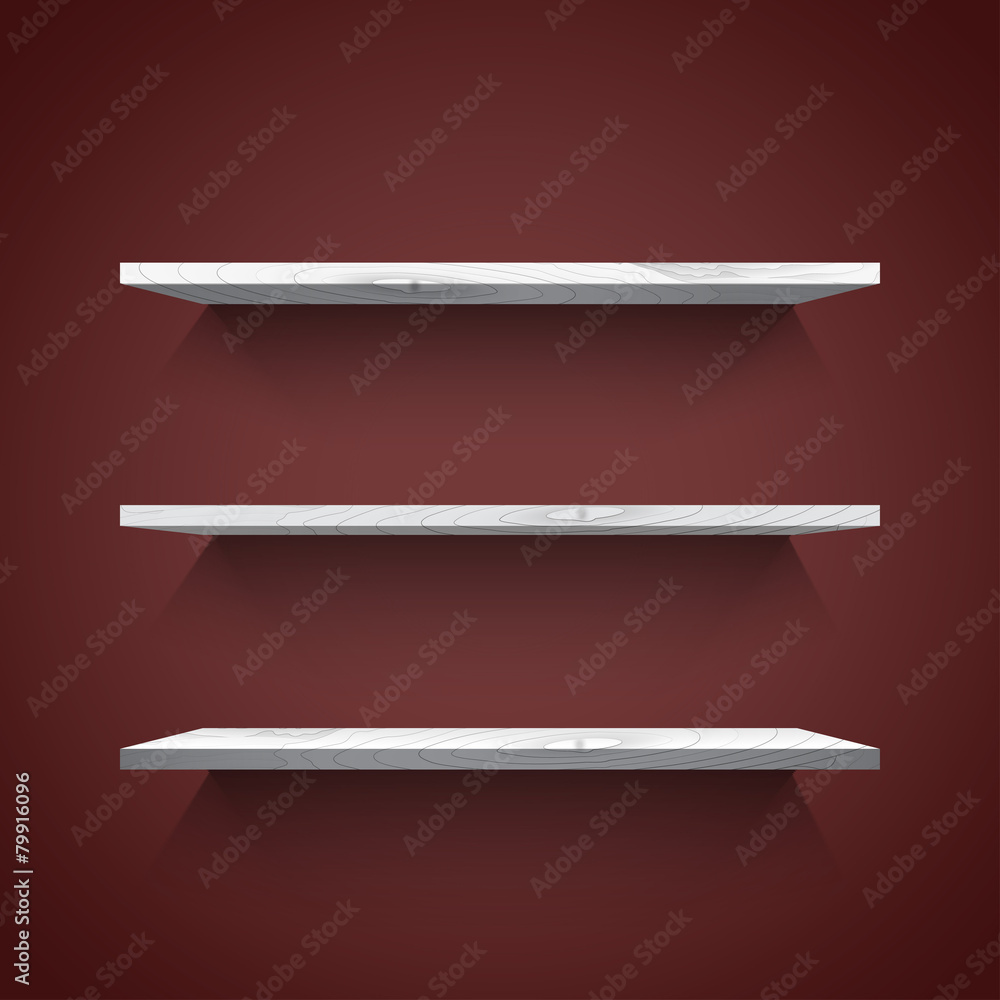 Empty white shelves on the dark wall Empty white shelves on the dark wall