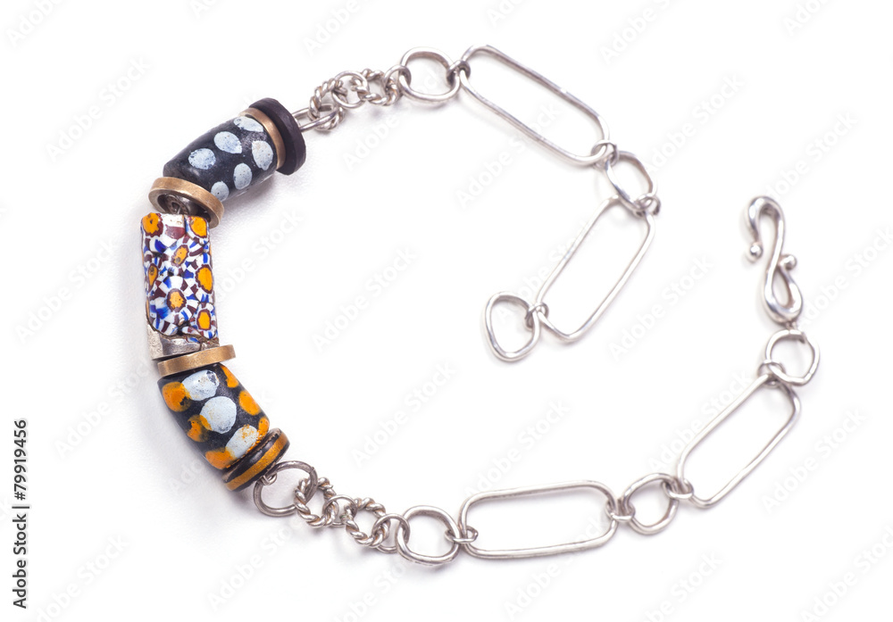 Close up of silver and painted stone necklace Close up of silver and painted stone necklace