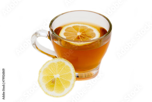 Tea with lemon on cup on white background