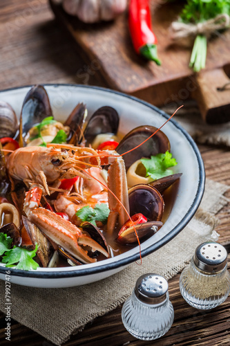 Tasty seafood soup with langoustines and mussels