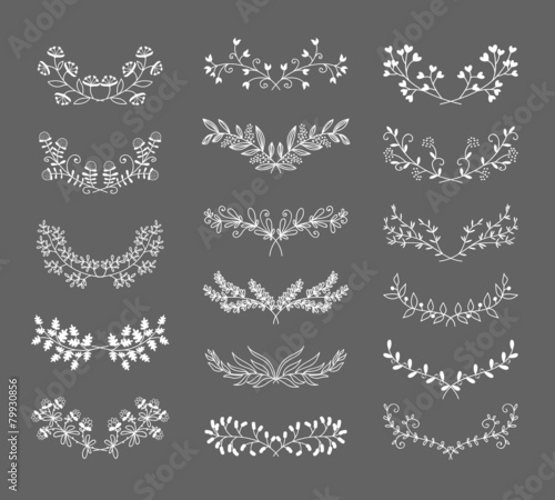 Symmetrical floral graphic design elements