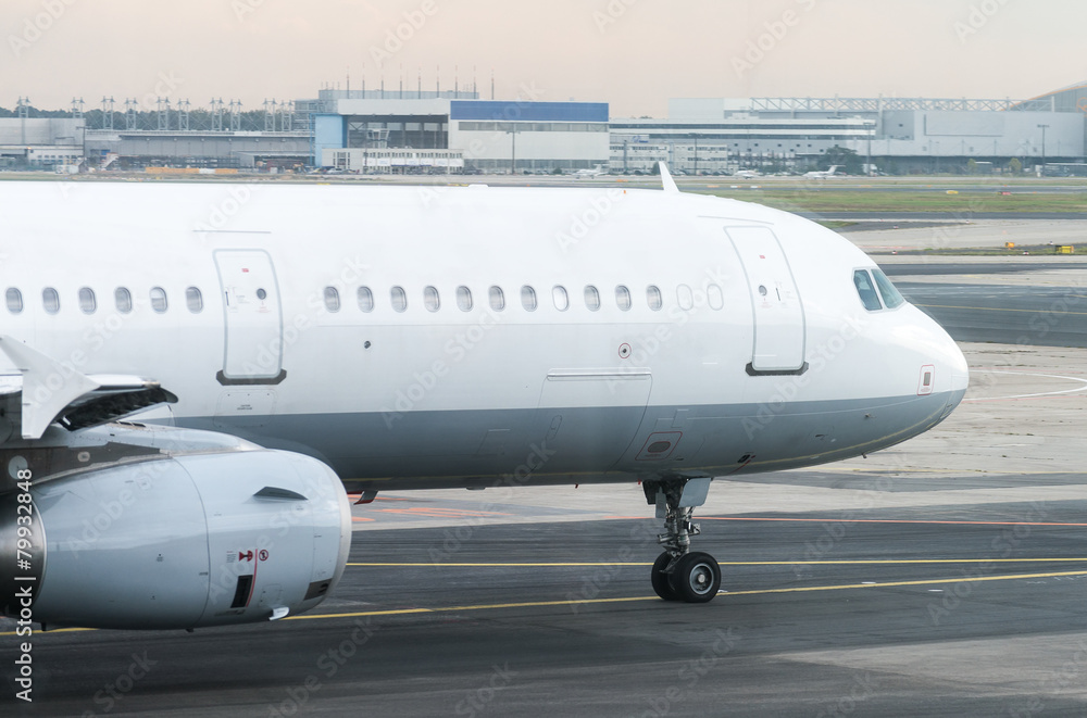 Passenger plane is taking off. Passenger plane is taking off.