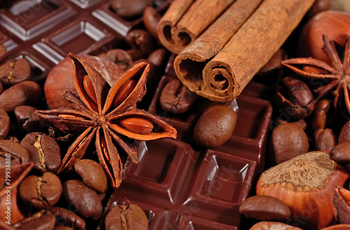 Coffee, chocolate, star anise, cinnamon sticks and hazelnuts