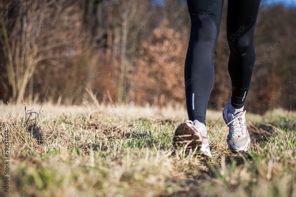 Jogging outdoors in a meadow 