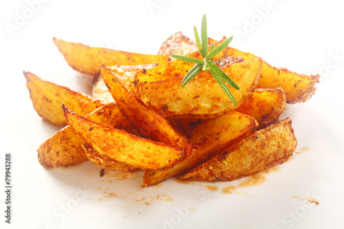Gourmet Spicy Fried Potato Wedges on Plate