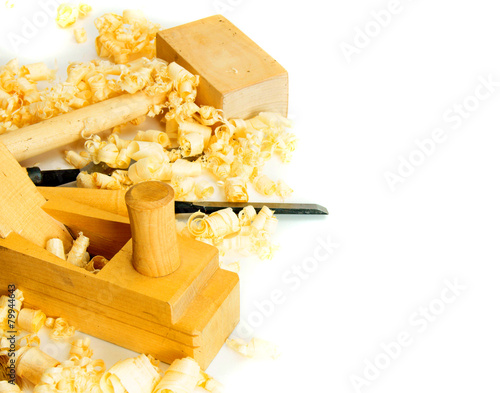 Joiner's tools (chisel, hammer) on a white background.