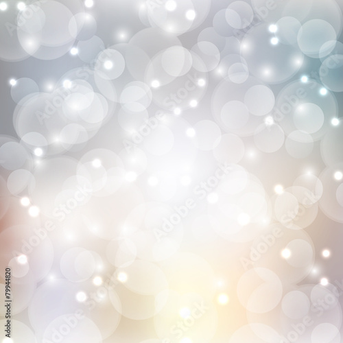 Silver bokeh abstract light background.