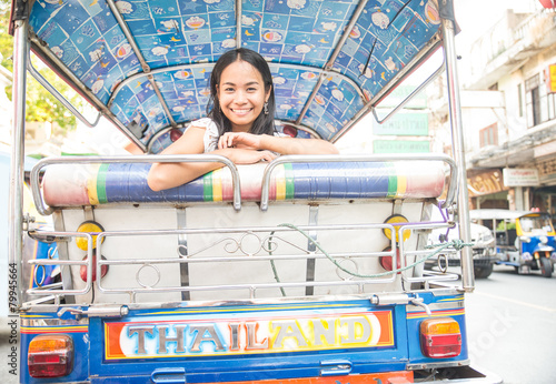 Canvas Print Asian woman on tuk tuk