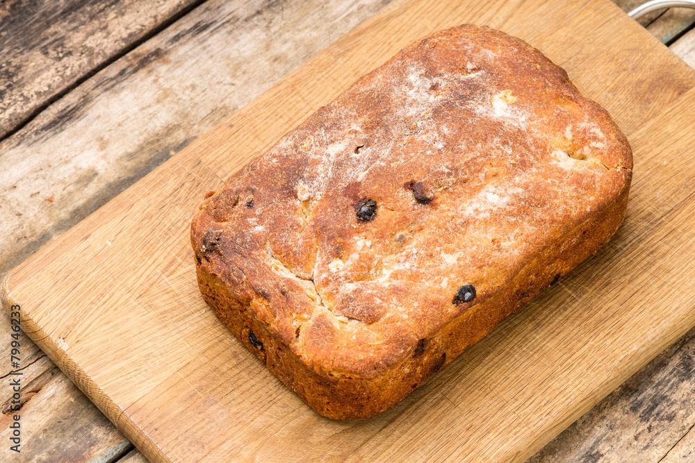 Loaf of bread on cutting board Loaf of bread on cutting board