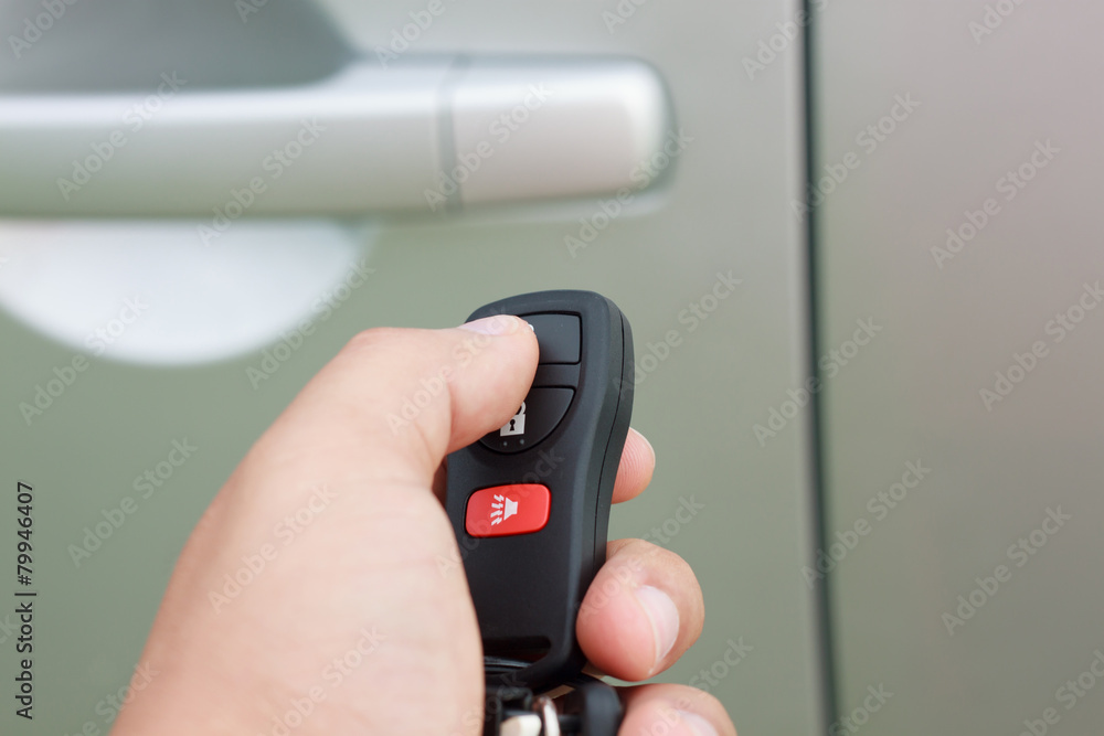 hand presses on the remote control car alarm systems hand presses on the remote control car alarm systems