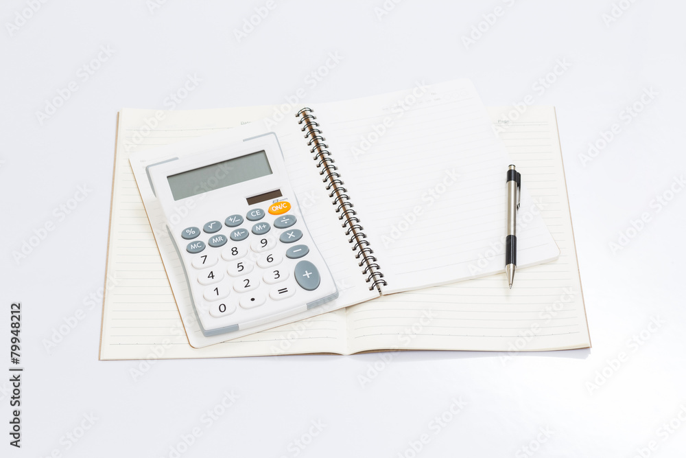 Blank notebook with office accessories on white table Blank notebook with office accessories on white table