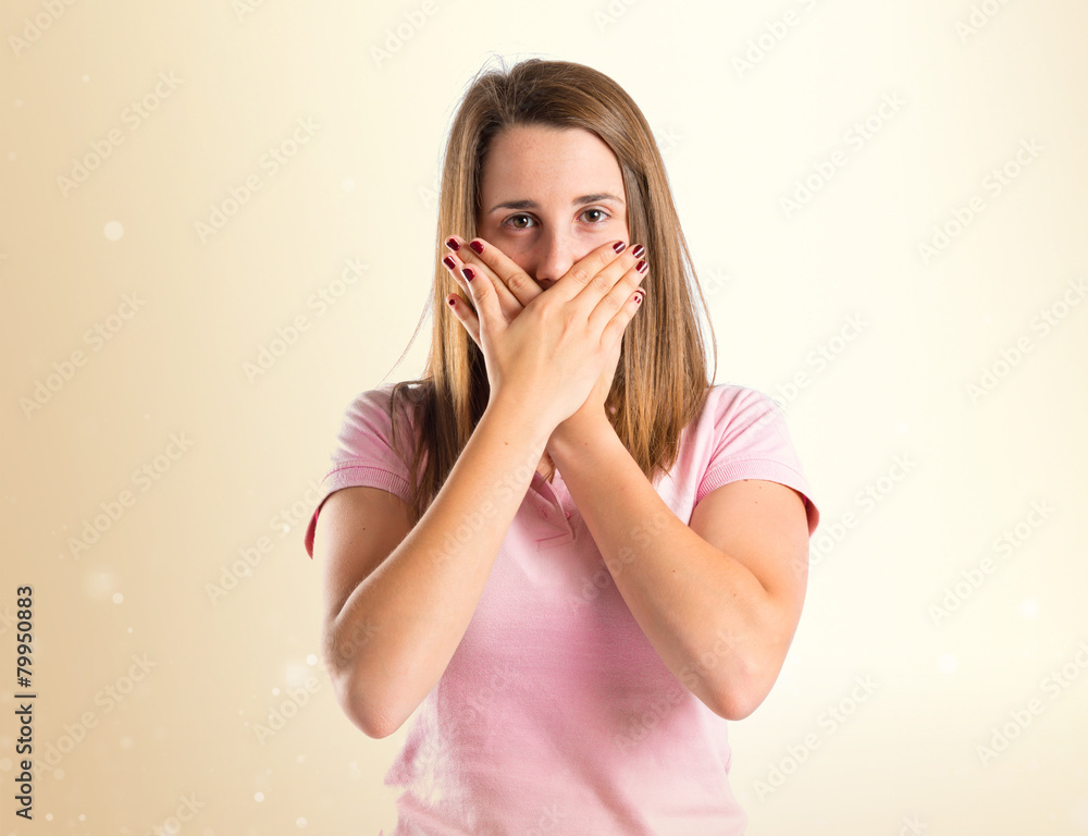 Young girl doing surprise gesture over white background Young girl doing surprise gesture over white background