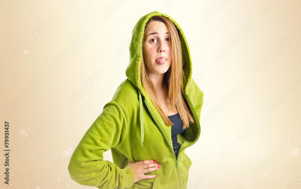 Young girl doing a joke over isolated white background Young girl doing a joke over isolated white background