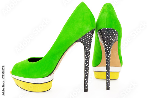 Pare of bright green and yellow high heel shoes isolated on whit photo