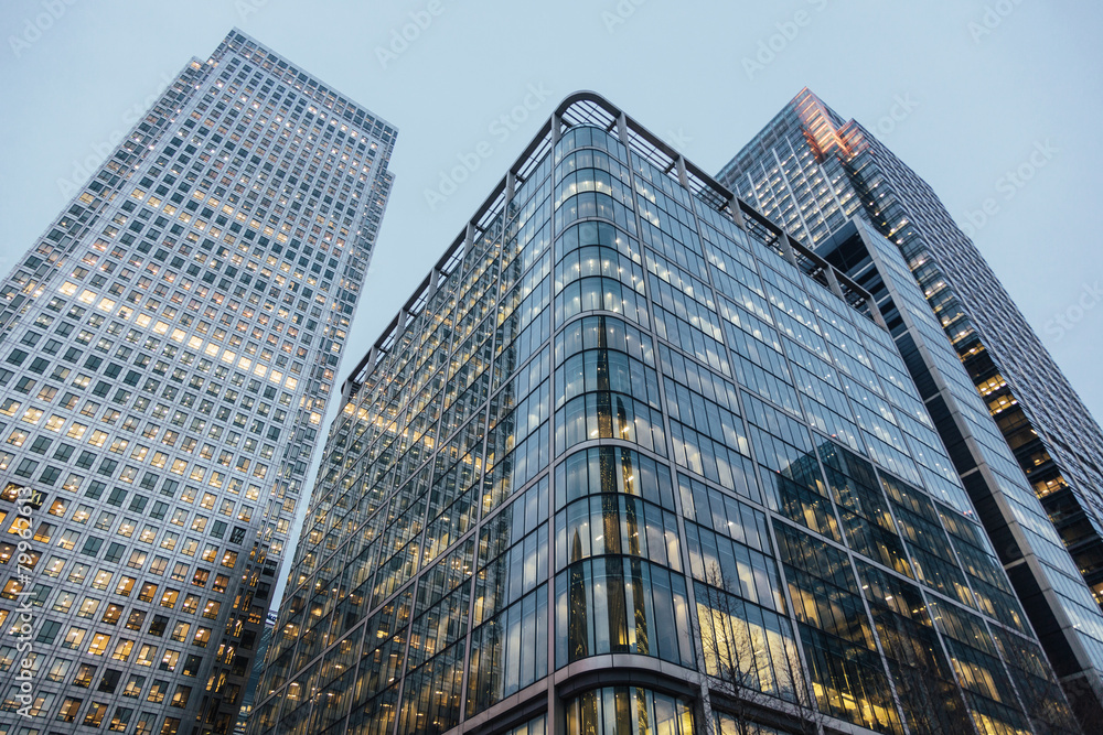 Fototapeta premium Modern skyscrapers in London at sunset, bottom view.