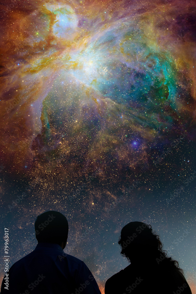Silhouettes of couple looking at stars. Starry night sky with Silhouettes of couple looking at stars. Starry night sky with